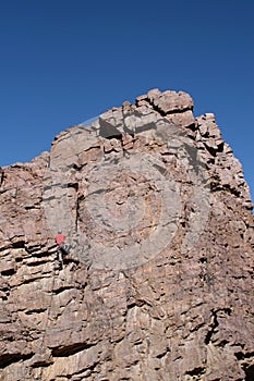 A climber heading for the top