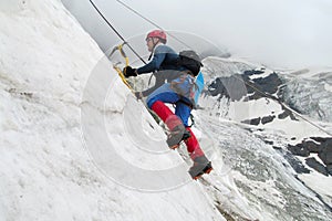 Climber with ice axes