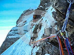 Climber in ice climbing photo