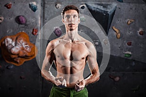 Climber man getting ready for climb