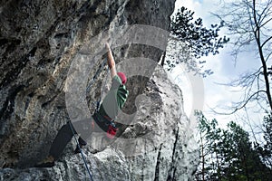 Climber on an overhanging wall, very hard route, Laboratorium, Jura, Polska
