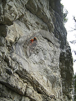 Climber at Postalmklamm via ferrata in Austria