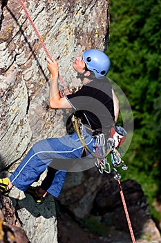 A climber rappelling