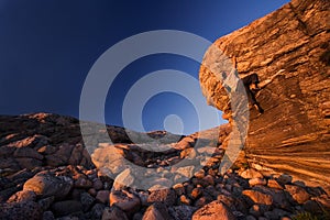 Climber reaching towards the top