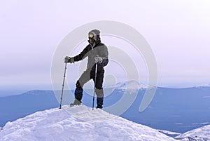 Climber on a snowy mountain top