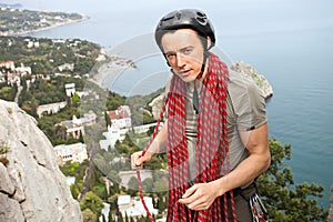 Climber on a top of a mountain