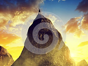 Climber on the top of the mountain.