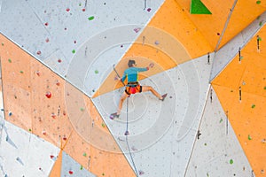 The climber trains on an artificial relief