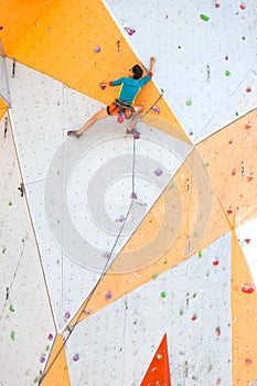 The climber trains on an artificial relief