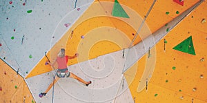 The climber trains on an artificial relief