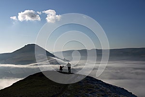 Climbers above the fog photo