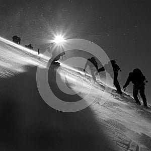 Climbers climbing the glacier photo