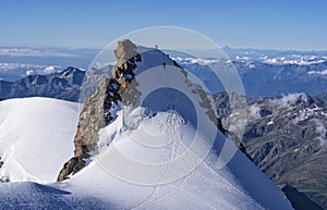 Climbers on Corno Nero peak, Monte Rosa, Alps, Italy photo