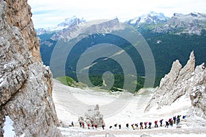 Climbers on dolomite in italy photo