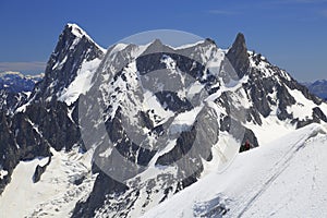 Climbers on French Alps Mountains near Aiguille du Midi, France