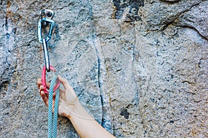 Climbers hold and quick-draw