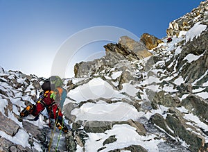 Climbers at the mountain summit in scenic Tian Shan range