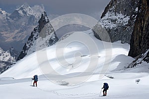 Climbers roped together in search of a way between crevices, Himalaya, Nepal