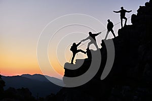 Climbers working together