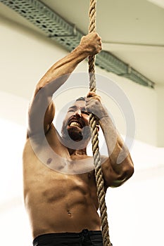 Climbiing with rope photo