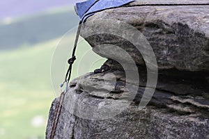 Climbing anchor on rock edge