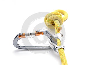 Climbing ascender, rope, carabiner, knot isolated on white. Climbing tools photo