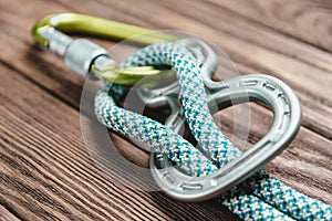 Climbing belay device with rope. photo