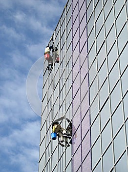 Climbing on the building for wash