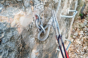Climbing carabiner on a steel rope