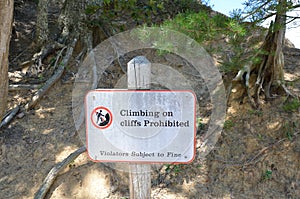 Climbing on cliffs prohibited sign violators subject to fine