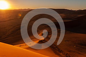 Climbing Dune 45 at sunrise