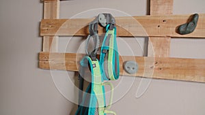 climbing equipment hanging on wall