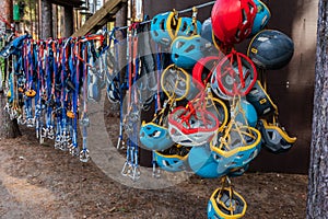 Climbing equipment: ropes with carabiners, safety belts, helmets