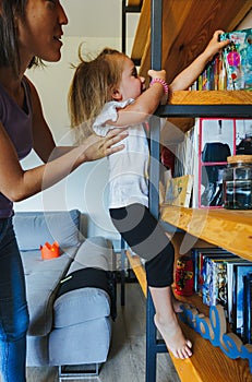 Climbing, fighting joyful mom, daughter play