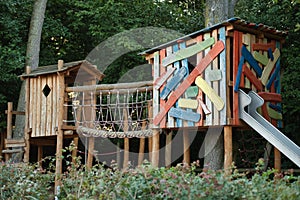 Climbing frame with a slide in a playground at a school