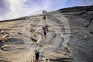 Climbing the Half Dome Cables, Yosemite National Park, California photo