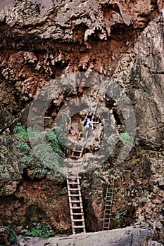 Climbing a ladder in the Grand Canyon