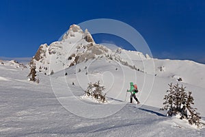 Climbing on mountain in winter