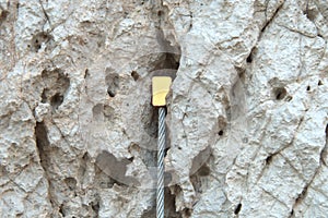 Climbing nut placed on rock crack