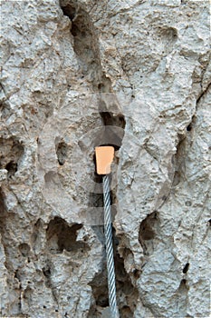 Climbing nut placed on rock crack