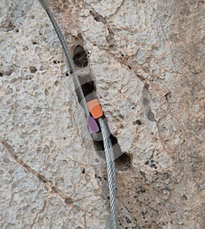 Climbing nut placed on rock crack