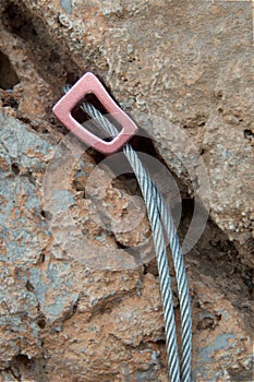 Climbing nut placed on rock crack