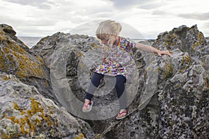 Climbing through the rocks on a summers day