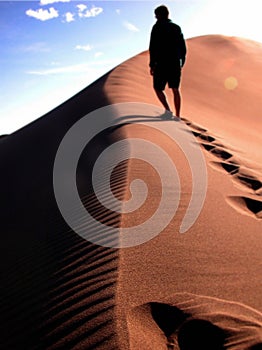Climbing a sand dune in colorado