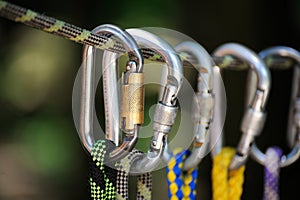 Climbing sports image of a carabiner on a rope