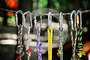 Climbing sports image of a carabiner on a rope