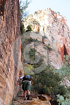 Climbing steep cliffs