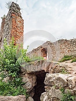 Climbing to a castle from the thirteenth century built from white limestone