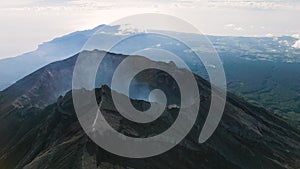 Climbing to the top of Mount Agung. Active volcano caldera. Aerial view. Bali island