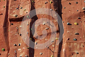 Climbing wall background with ropes.
